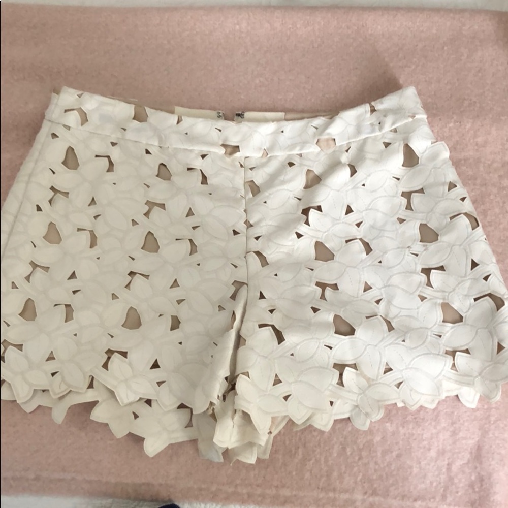 Alice and Olivia white leather shorts